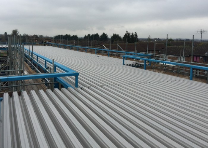 A Complete Guide to Industrial Roofing Solutions - Roof Installation ...